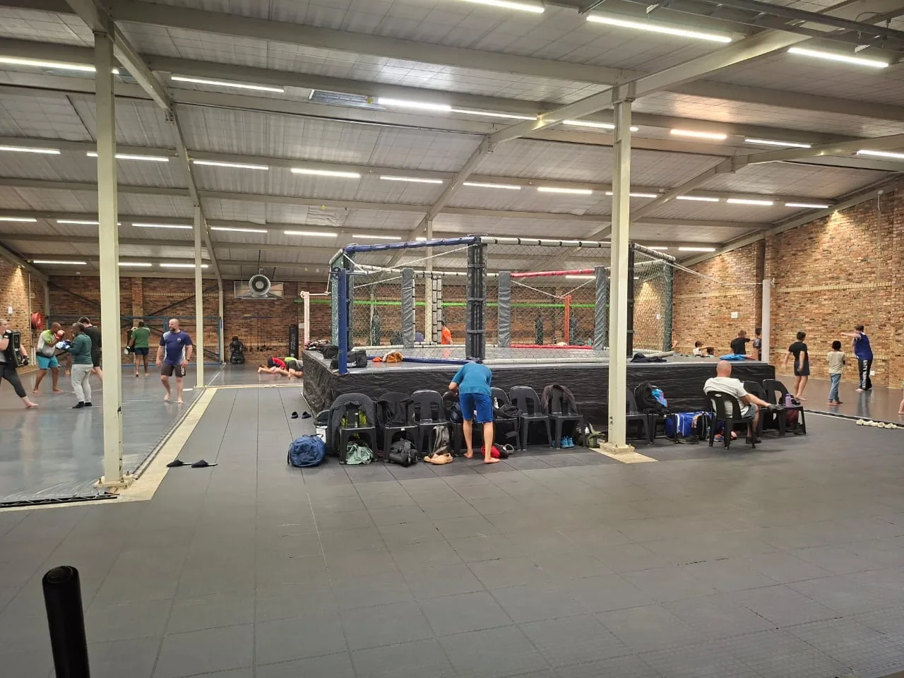 The cage and training hall at Mighty Warriors
