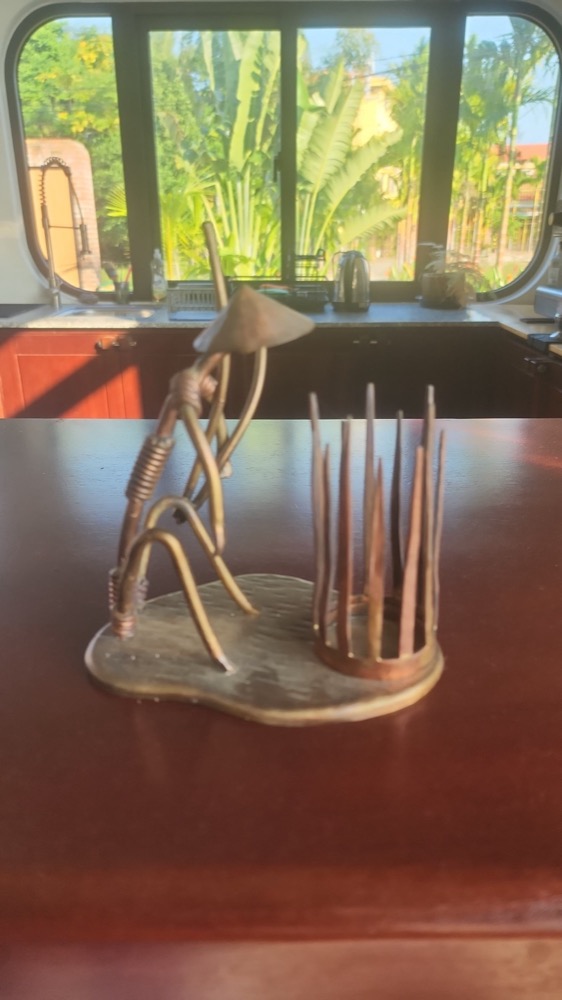 A handmade bronze piece from the Thai Combat Gym shop